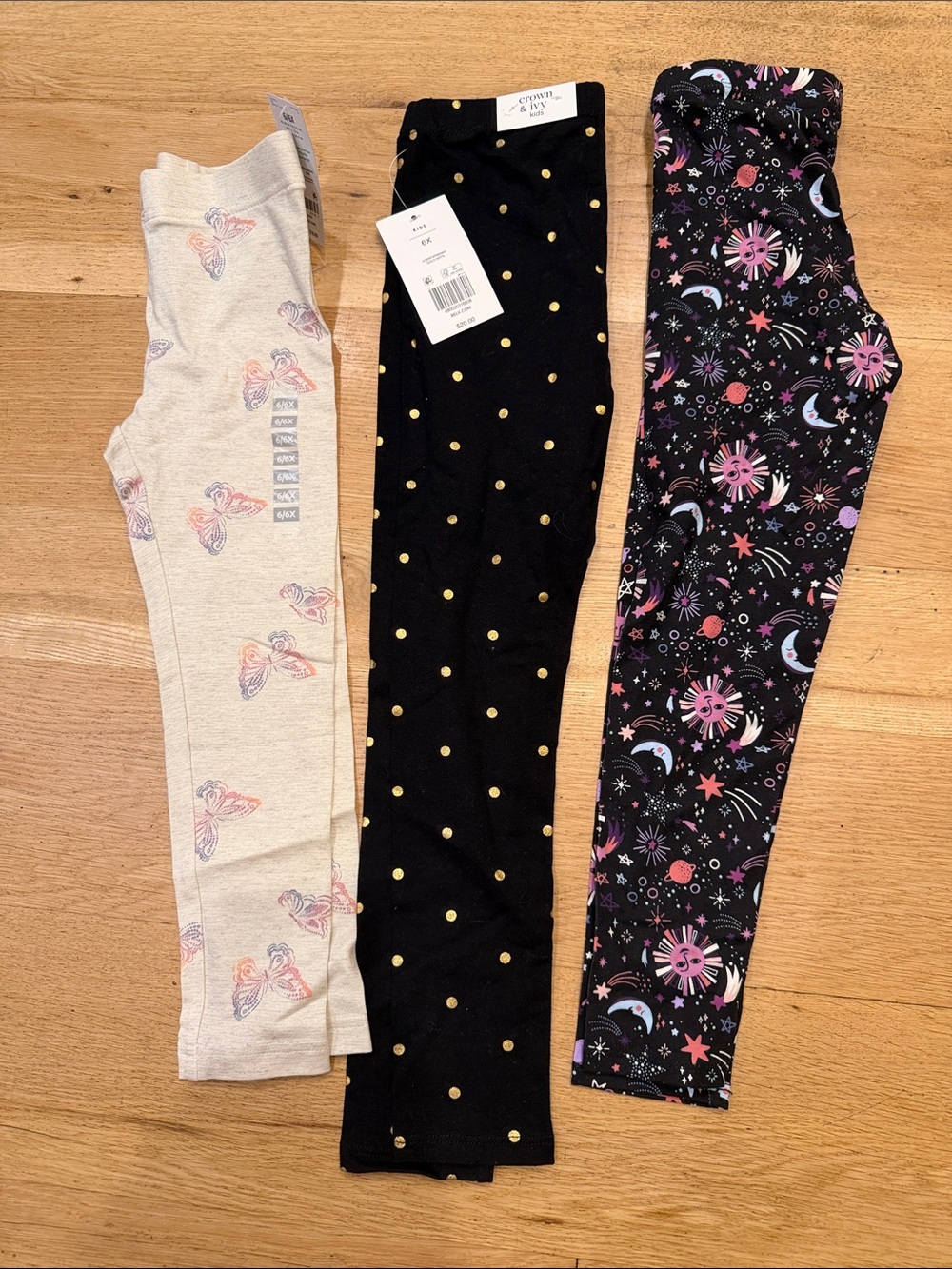 crown & ivy Three-Pack Girls' Leggings in Black, Cream & Black Patterned